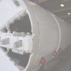 Tunnel boring machine inside a workshop.